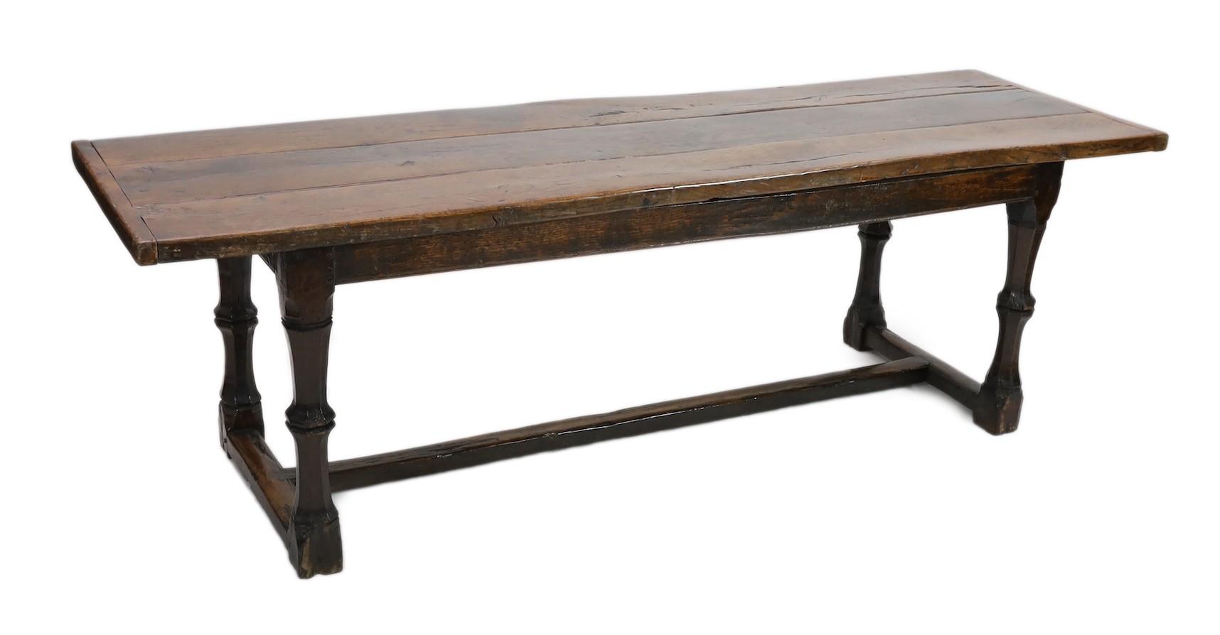 A Charles I oak refectory table, c.1630, 253 x 77cm, height 79cm